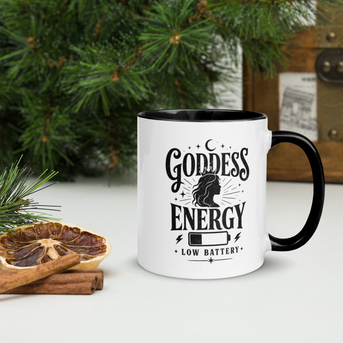 Goddess Energy (Low Battery) white ceramic coffee mug with black rim, handle, and interior